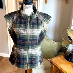 Cute fitted wool plaid vest with great details.